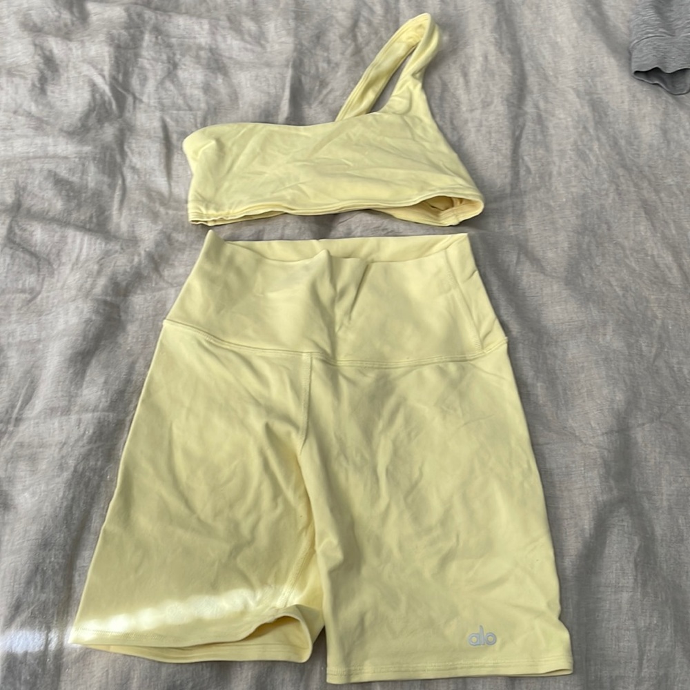Alo biker short and one shoulder bra set.